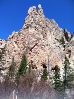 Those two black spots are the cave. But it was higher up than it looks! I promise.